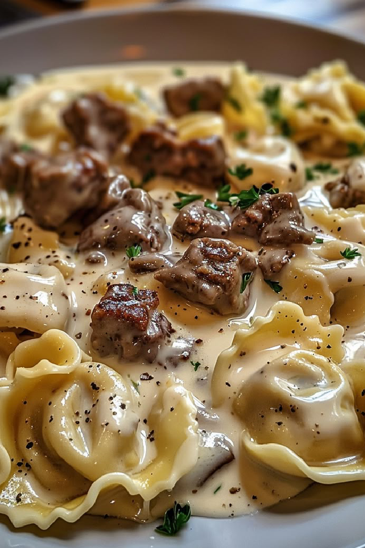 Savory Cheesesteak Tortellini in Creamy Provolone Sauce
